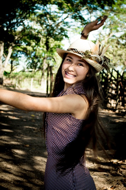 happy, strong girl in hat